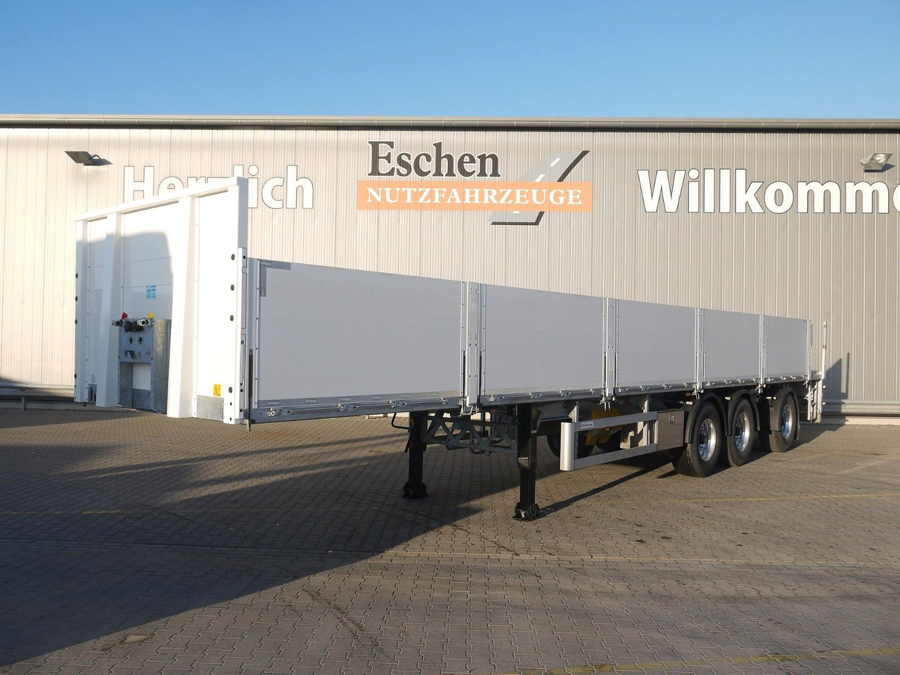 Schröder 12,85m|Rollkran-Kran*Pritsche*Lenkachse - Semi-reboque plataforma/ Caixa aberta: foto 1 Schröder 12,85m|Rollkran-Kran*Pritsche*Lenkachse - Semi-reboque plataforma/ Caixa aberta: foto 1