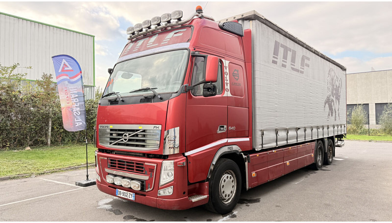 Volvo FH13 540 - Camião de lona: foto 1 Volvo FH13 540 - Camião de lona: foto 1