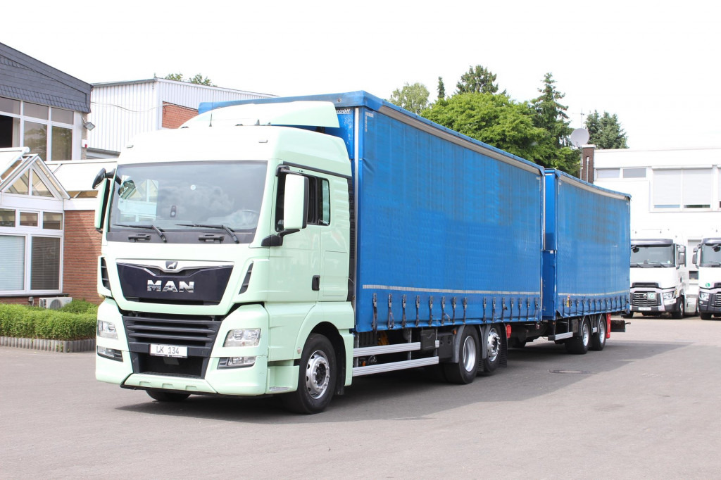MAN TGX 26.460 Retarder Jumbo-Zug 120M3 Durchlade - Camião de lona: foto 1 MAN TGX 26.460 Retarder Jumbo-Zug 120M3 Durchlade - Camião de lona: foto 1