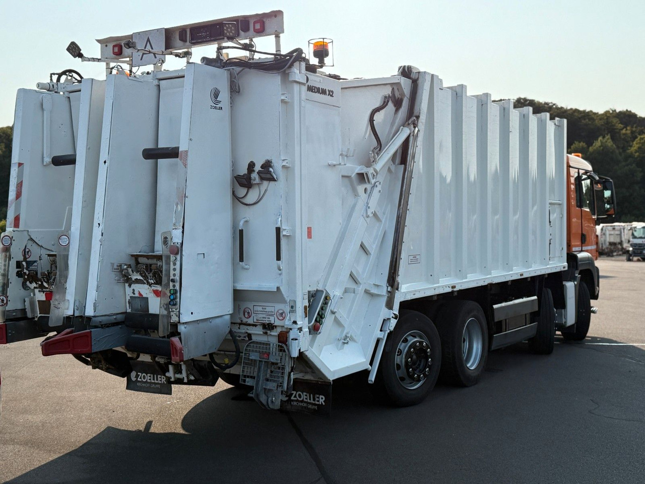 MAN TGS 32.360 8x2 Zoeller Mekam, duo Schütte - Caminhão de lixo: foto 4 MAN TGS 32.360 8x2 Zoeller Mekam, duo Schütte - Caminhão de lixo: foto 4