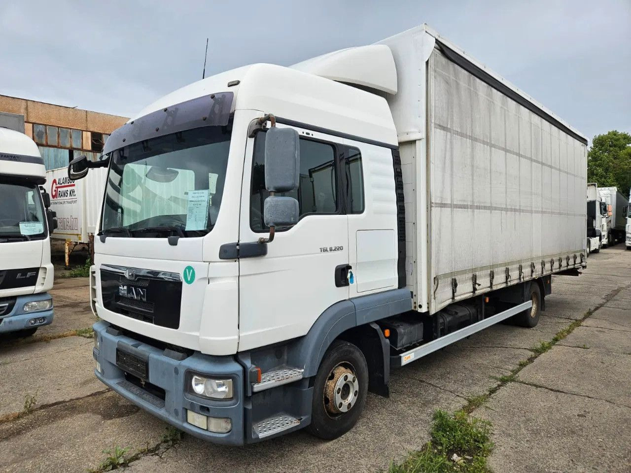 MAN TGL 8.220 4x2 BL Euro 5 EEV - Camião de lona: foto 1 MAN TGL 8.220 4x2 BL Euro 5 EEV - Camião de lona: foto 1