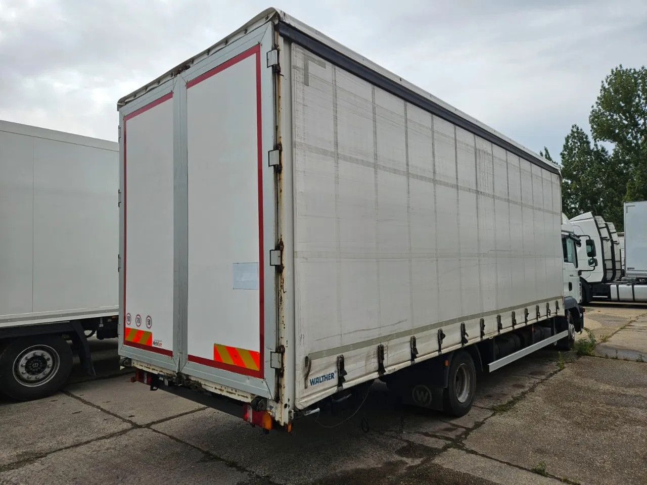 MAN TGL 8.220 4x2 BL Euro 5 EEV - Camião de lona: foto 4 MAN TGL 8.220 4x2 BL Euro 5 EEV - Camião de lona: foto 4