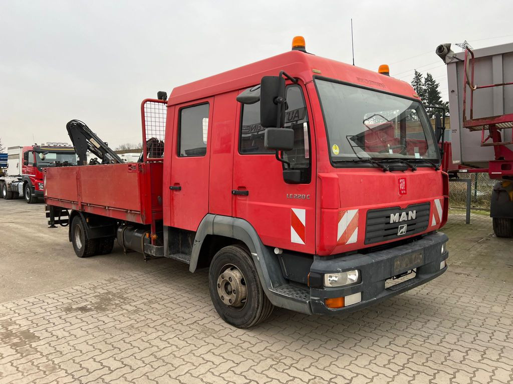MAN LE 12.225 LC Pritsche Heckkran 6 Zylinder Doka Topzust - Camião de caixa aberta/ Plataforma, Camião grua: foto 2 MAN LE 12.225 LC Pritsche Heckkran 6 Zylinder Doka Topzust - Camião de caixa aberta/ Plataforma, Camião grua: foto 2