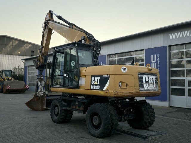 Escavadeira de rodas CAT M318D Mobilbagger *9.235 h *Schnellw. *Greifer: foto 9 Escavadeira de rodas CAT M318D Mobilbagger *9.235 h *Schnellw. *Greifer: foto 9