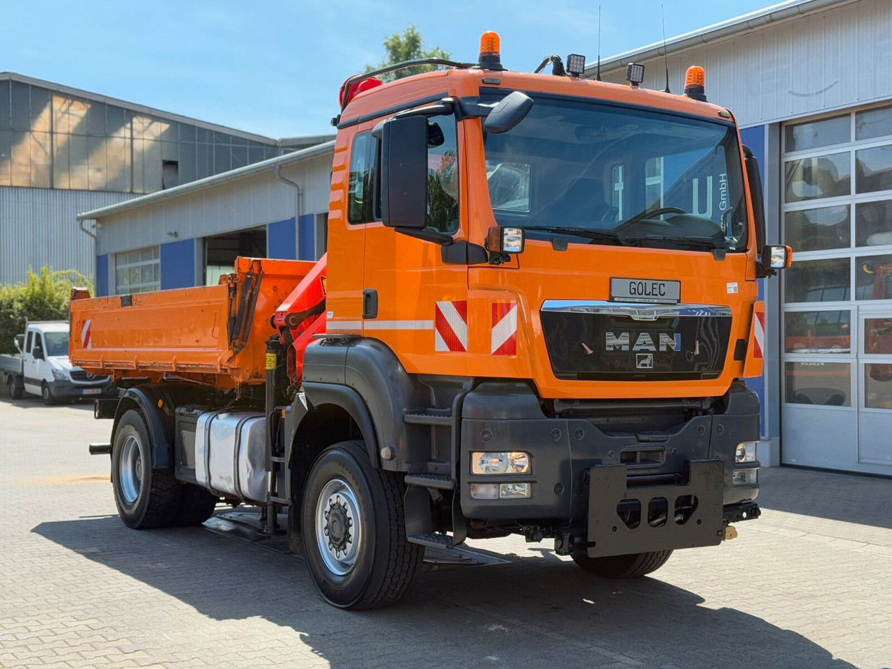 MAN TGA 18.360 4x4 Kipper Kran PALFINGER Winterd. - Camião grua: foto 1 MAN TGA 18.360 4x4 Kipper Kran PALFINGER Winterd. - Camião grua: foto 1