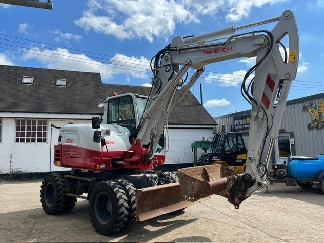 Takeuchi TB295W - Escavadeira de rodas: foto 2 Takeuchi TB295W - Escavadeira de rodas: foto 2