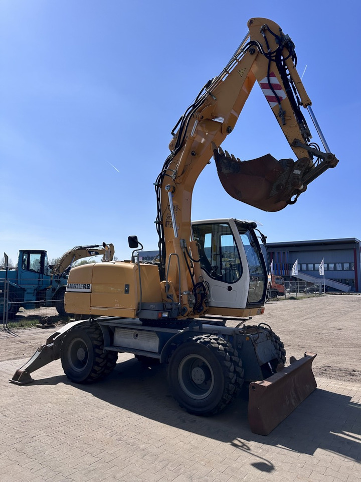 LIEBHERR A 314 All hydr. lines SW 33- 30 Km/h - Escavadeira de rodas: foto 2 LIEBHERR A 314 All hydr. lines SW 33- 30 Km/h - Escavadeira de rodas: foto 2