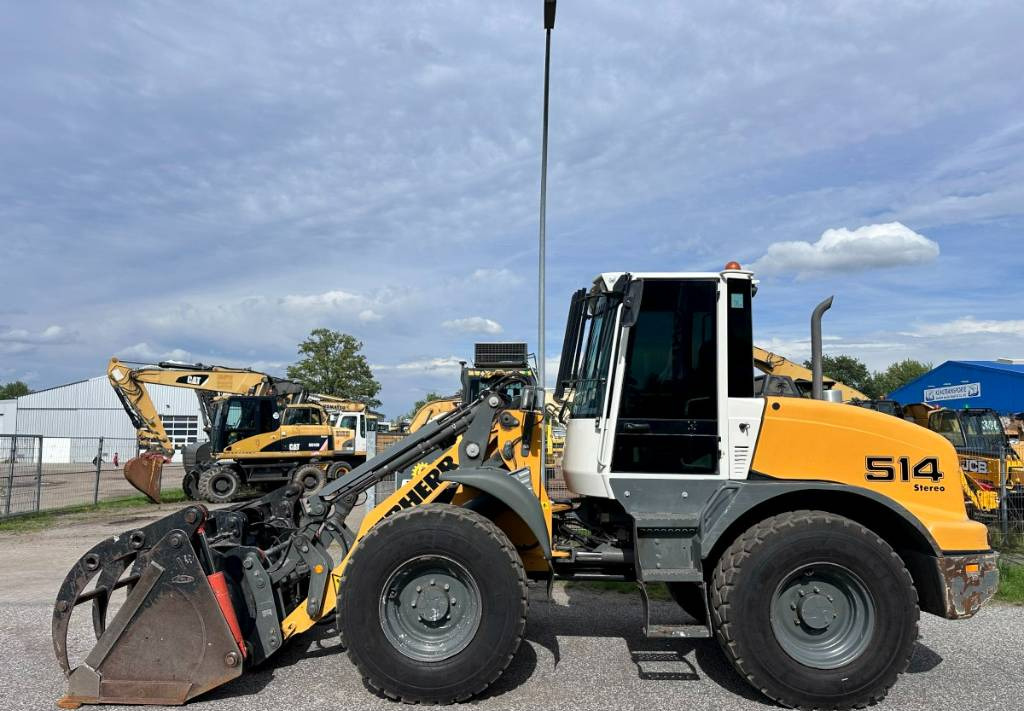 Liebherr L 514 Stereo +30 Kmh Klima 3er Kreis Greifschaufel - Pá carregadora de rodas: foto 1 Liebherr L 514 Stereo +30 Kmh Klima 3er Kreis Greifschaufel - Pá carregadora de rodas: foto 1