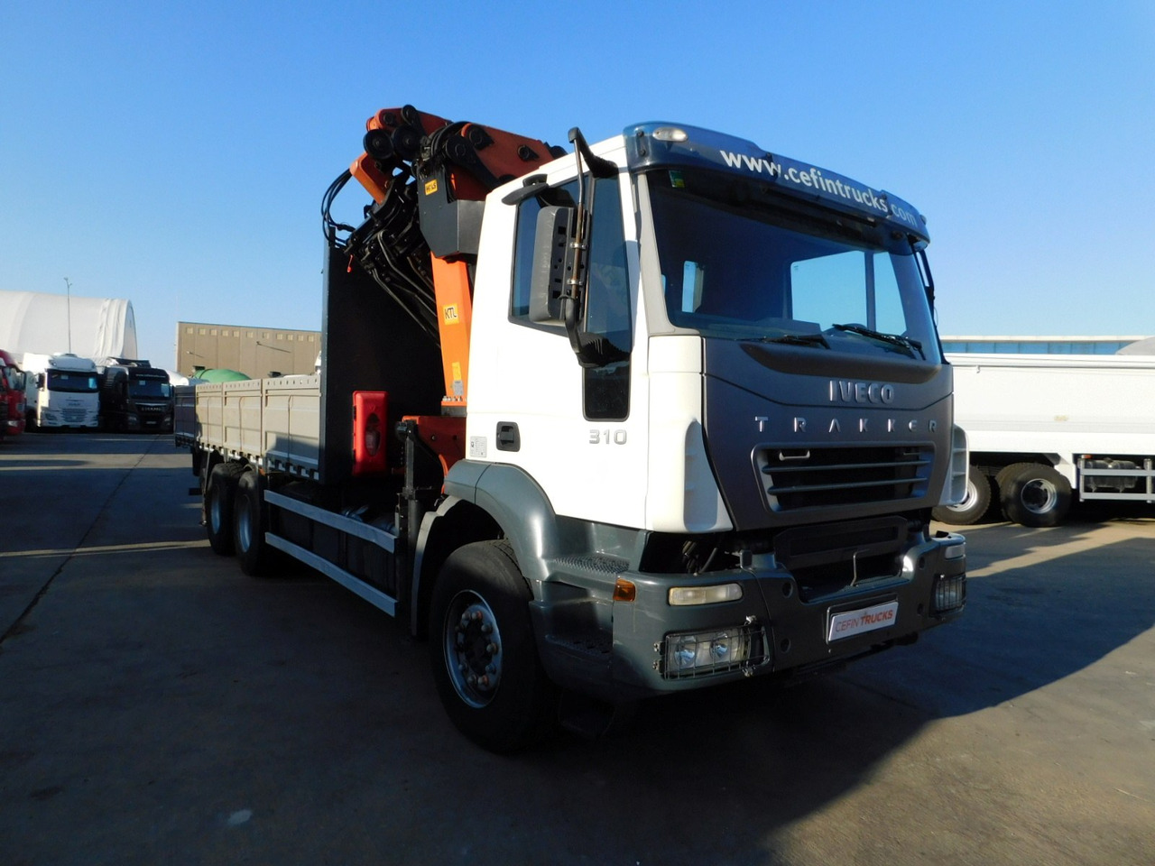 Iveco Magirus trakker - Camião de caixa aberta/ Plataforma, Camião grua: foto 2 Iveco Magirus trakker - Camião de caixa aberta/ Plataforma, Camião grua: foto 2