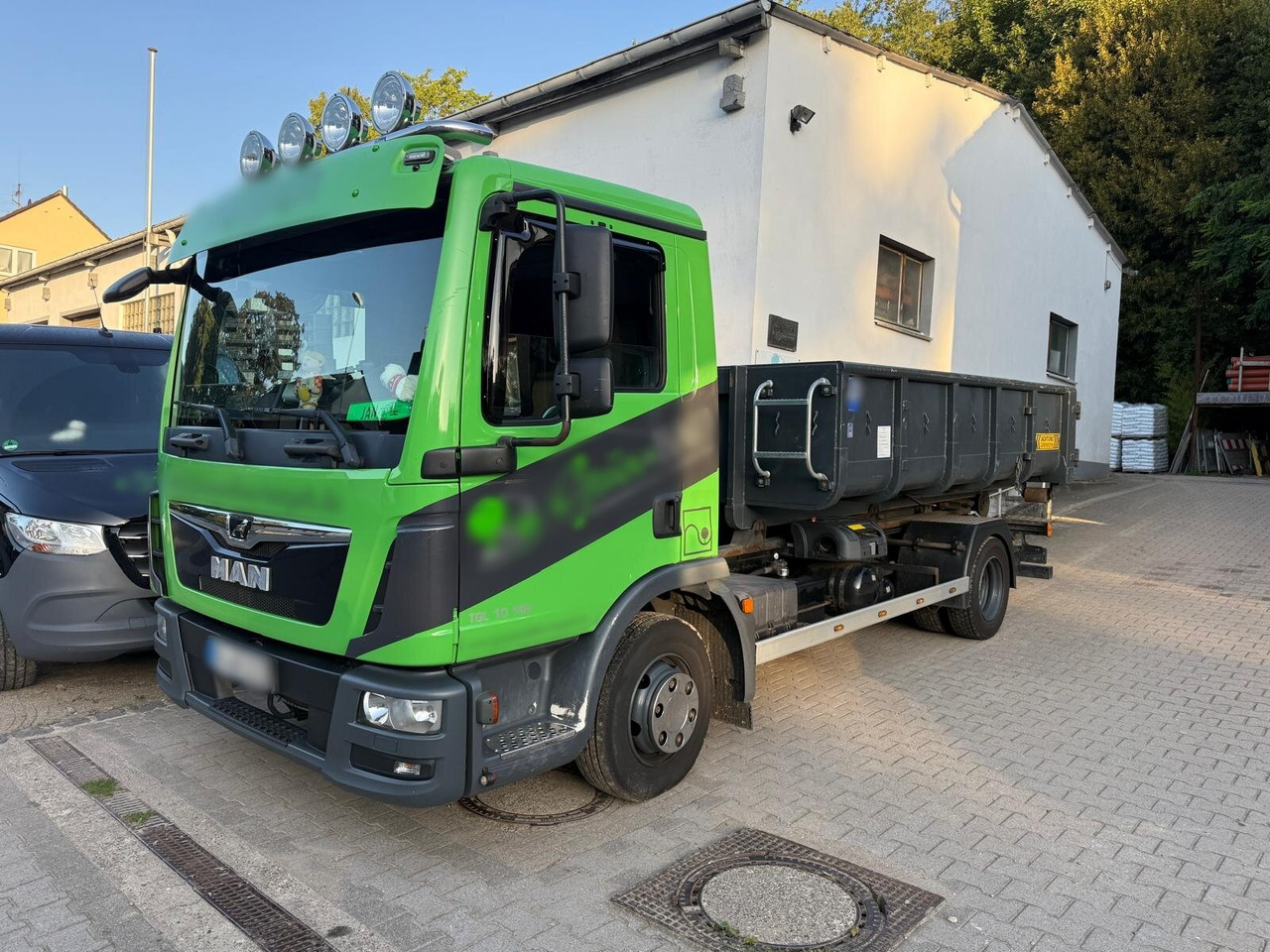 MAN TGL 10.180 4x2 BL TGL 10.180 4x2 BL City-Abrollkipper - Camião polibenne: foto 1 MAN TGL 10.180 4x2 BL TGL 10.180 4x2 BL City-Abrollkipper - Camião polibenne: foto 1