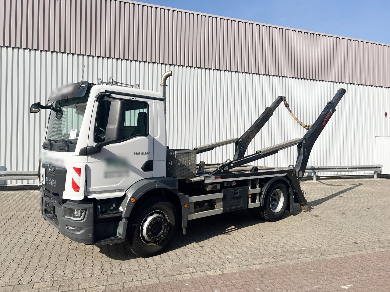 MAN TGM 18.320 4x2 BL TGM 18.320 4x2 BL, Hiab Tele-Absetzanlage, Funk - Camião multibenne: foto 1 MAN TGM 18.320 4x2 BL TGM 18.320 4x2 BL, Hiab Tele-Absetzanlage, Funk - Camião multibenne: foto 1