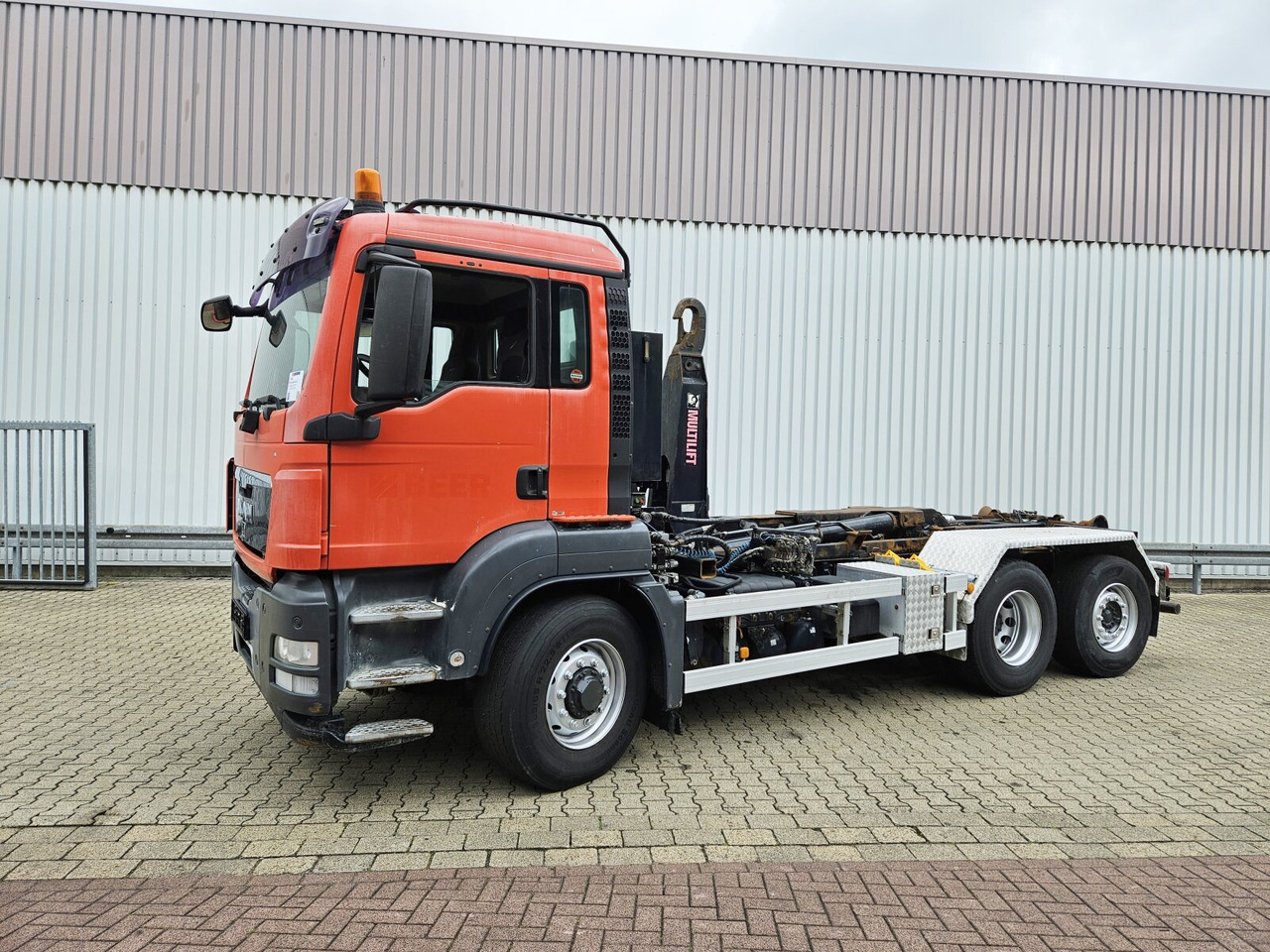 MAN TGS 26.480 6x4H-4 BL TGS 26.480 6x4H-4 BL, Multilift Abroller HydroDrive, Lenk-/Liftachse, Wechselfahrzeug - Camião polibenne: foto 1 MAN TGS 26.480 6x4H-4 BL TGS 26.480 6x4H-4 BL, Multilift Abroller HydroDrive, Lenk-/Liftachse, Wechselfahrzeug - Camião polibenne: foto 1