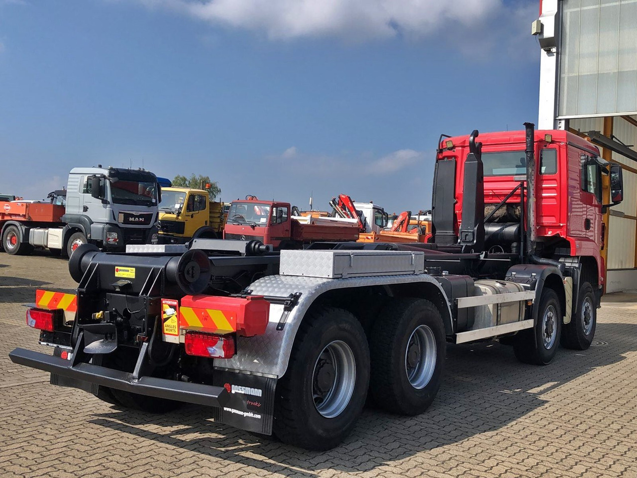 Camião chassi MAN TGS 41.480 8X8 BB TGS 41.480 8X8 BB, Bender Stahlmulde ca. 18m³, hydr. Heckklappe: foto 9