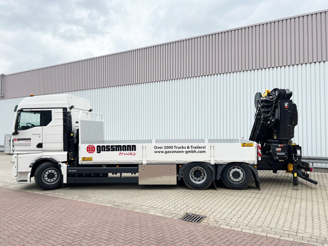 MAN TGX 26.510 6x2-4 LL CH TGX 26.510 6x2-4 LL, Kran Hiab X-HiPro 548 E-8, Lenk-/Liftachse, TwistLock 20Fuß, Funk, Retarder - Camião grua, Camião de caixa aberta/ Plataforma: foto 2 MAN TGX 26.510 6x2-4 LL CH TGX 26.510 6x2-4 LL, Kran Hiab X-HiPro 548 E-8, Lenk-/Liftachse, TwistLock 20Fuß, Funk, Retarder - Camião grua, Camião de caixa aberta/ Plataforma: foto 2