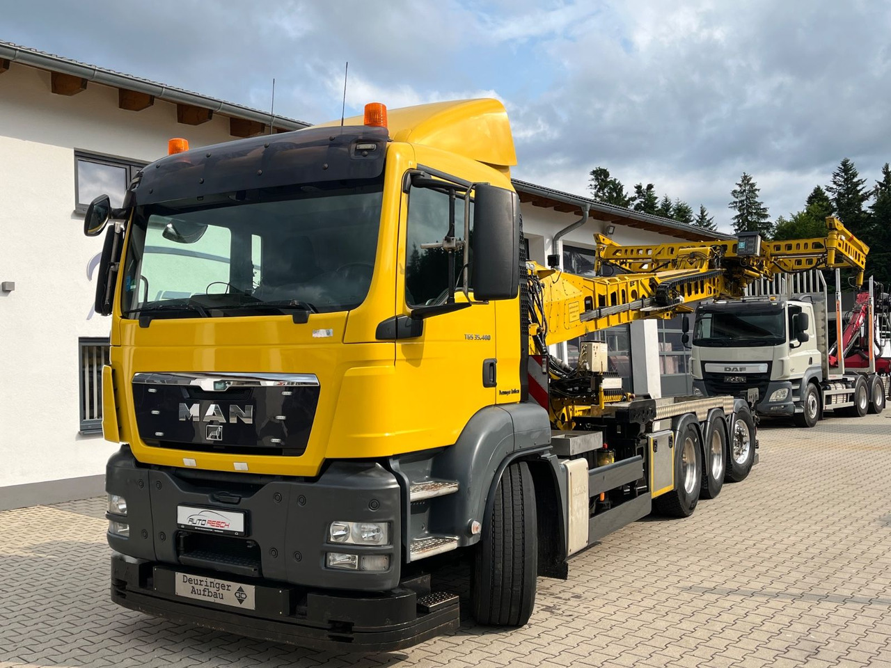 MAN TGS 35.480 8x4-4BL Deuringer Garagentransporter - Camião grua: foto 1 MAN TGS 35.480 8x4-4BL Deuringer Garagentransporter - Camião grua: foto 1