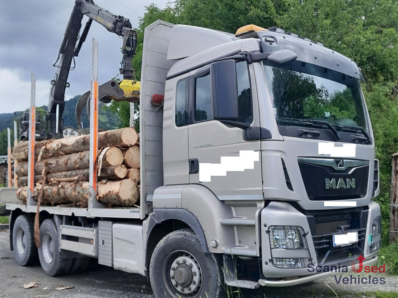 MAN TGS 33.500 6X4 HydroDrive + Penz 12Z - Camião de transporte de madeira, Camião grua: foto 1 MAN TGS 33.500 6X4 HydroDrive + Penz 12Z - Camião de transporte de madeira, Camião grua: foto 1