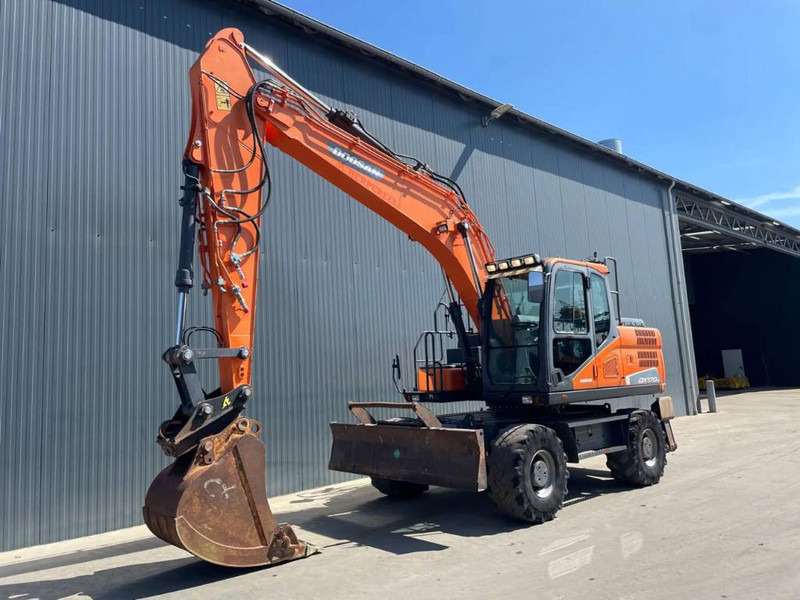Doosan DX170W-5 - Escavadeira de rodas: foto 1 Doosan DX170W-5 - Escavadeira de rodas: foto 1
