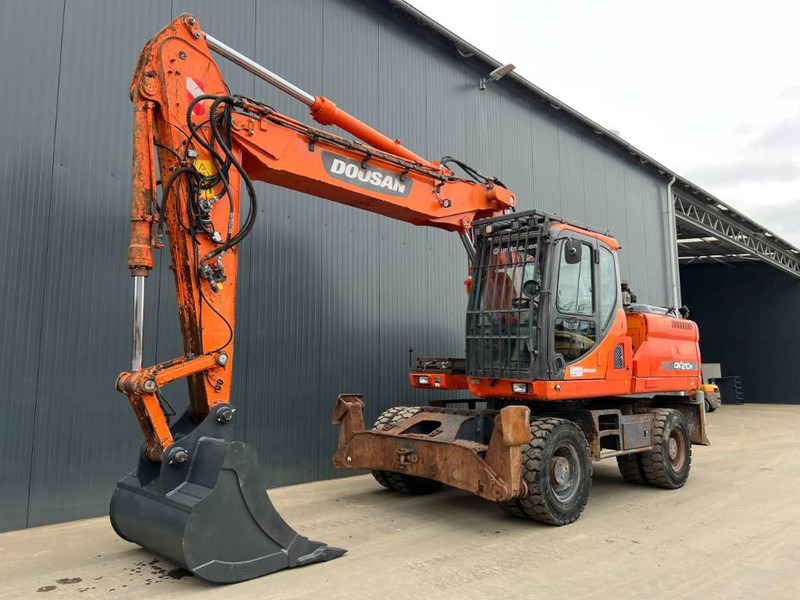 Doosan DX210W - Escavadeira de rodas: foto 1 Doosan DX210W - Escavadeira de rodas: foto 1
