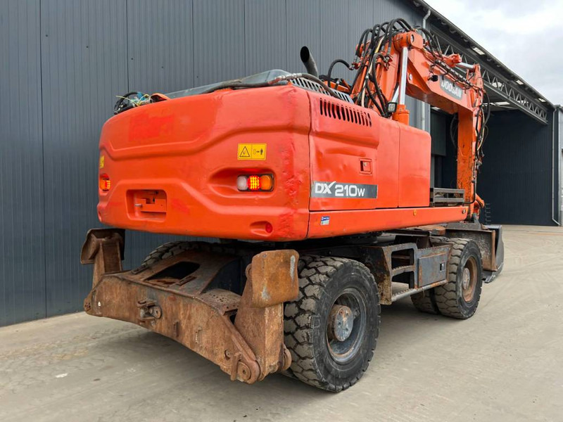 Doosan DX210W - Escavadeira de rodas: foto 4 Doosan DX210W - Escavadeira de rodas: foto 4