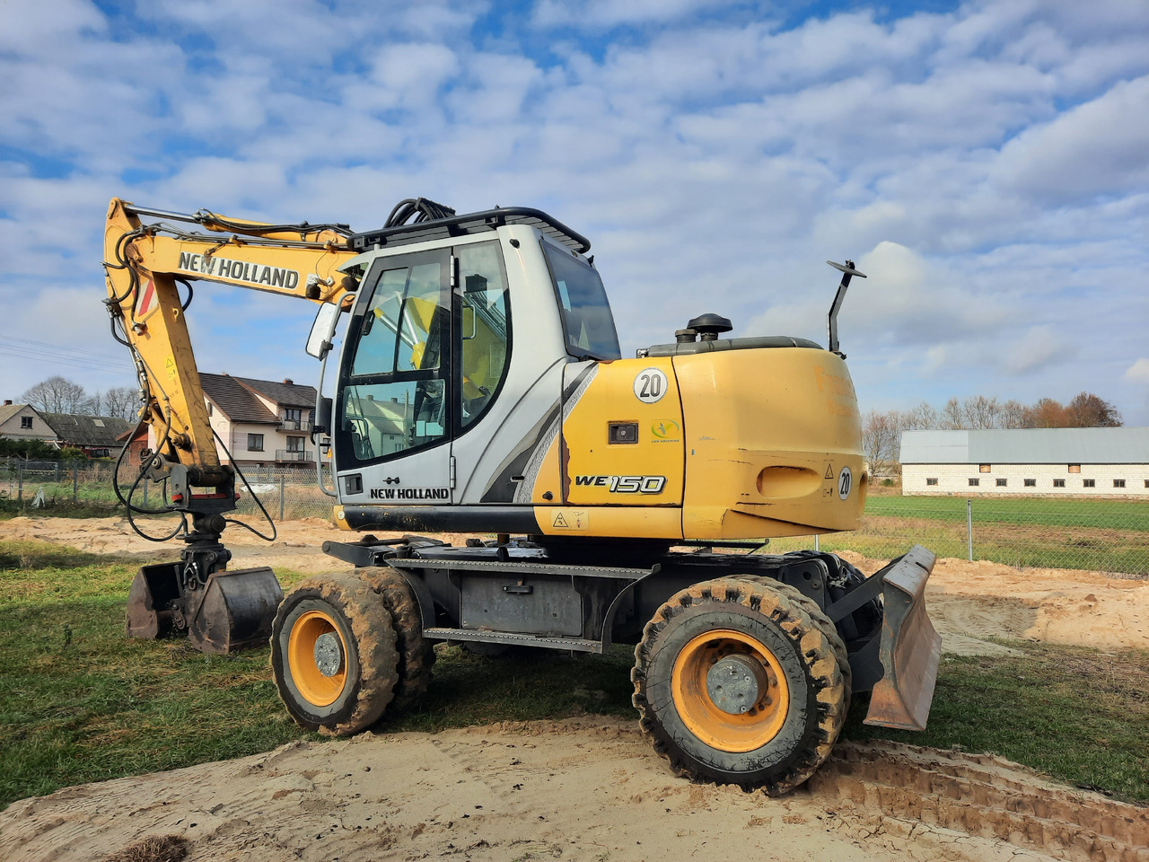 NEW HOLLAND WE150C - Escavadeira de rodas: foto 3 NEW HOLLAND WE150C - Escavadeira de rodas: foto 3