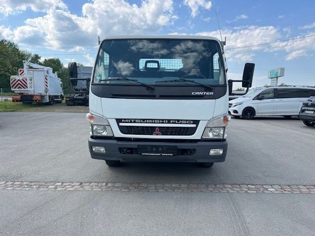 Mitsubishi Canter FE 85 Pritschenwagen - Camião de caixa aberta/ Plataforma: foto 2 Mitsubishi Canter FE 85 Pritschenwagen - Camião de caixa aberta/ Plataforma: foto 2