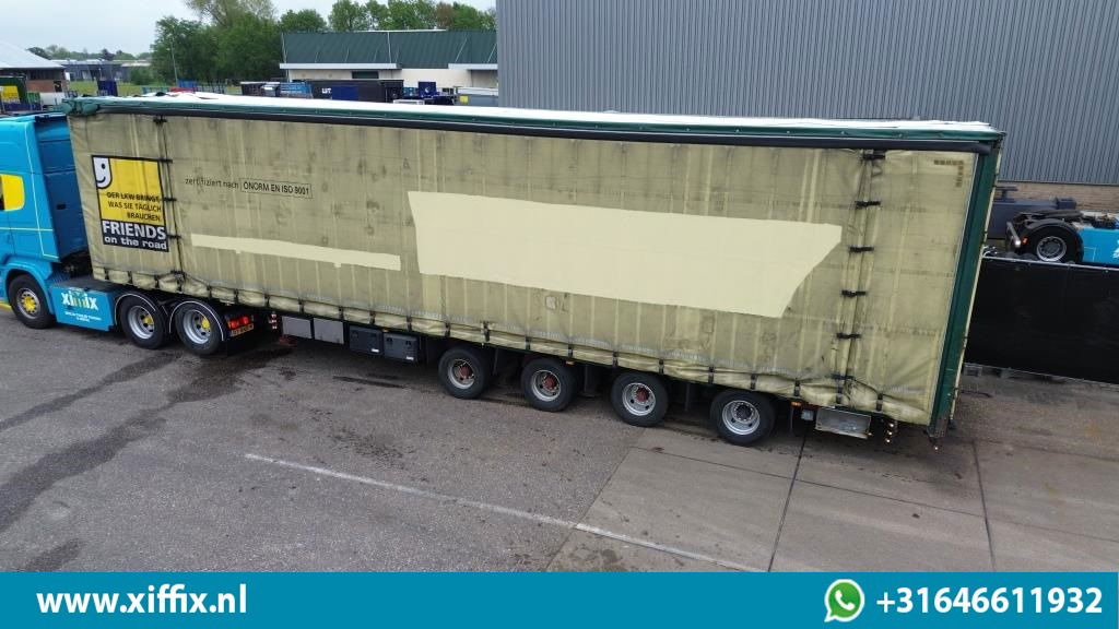 Meusburger 4-ass. Vlakke Mega oplegger met elektrische huifopbouw / 2x naloop ge - Semi-reboque plataforma/ Caixa aberta: foto 2 Meusburger 4-ass. Vlakke Mega oplegger met elektrische huifopbouw / 2x naloop ge - Semi-reboque plataforma/ Caixa aberta: foto 2