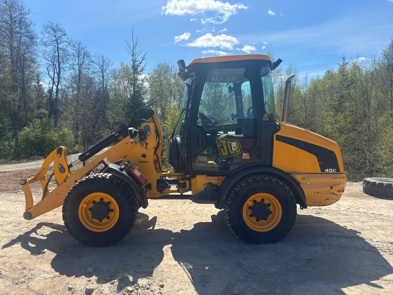 Pá carregadora de rodas JCB 406: foto 1