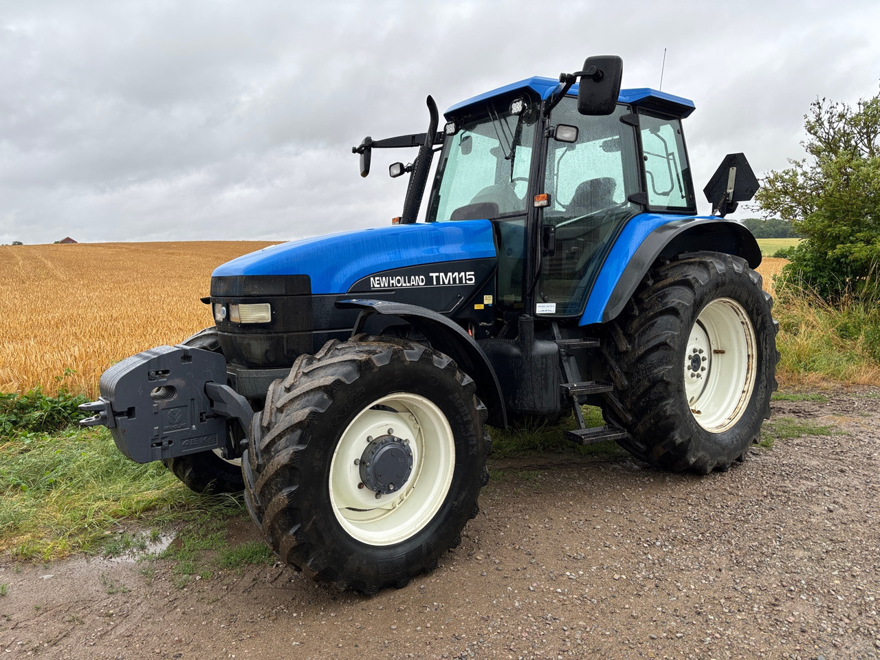 New Holland TM115 Turbo - Trator: foto 1 New Holland TM115 Turbo - Trator: foto 1