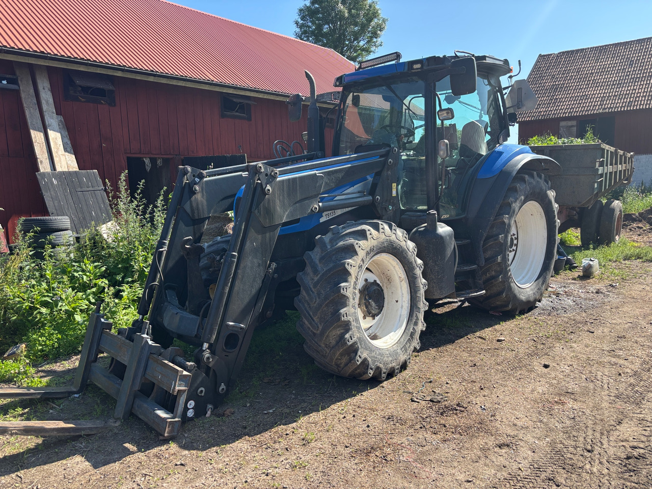 New Holland TS135A - Trator: foto 1 New Holland TS135A - Trator: foto 1
