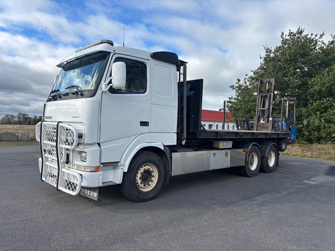 Volvo FH12 - Camião polibenne: foto 1 Volvo FH12 - Camião polibenne: foto 1