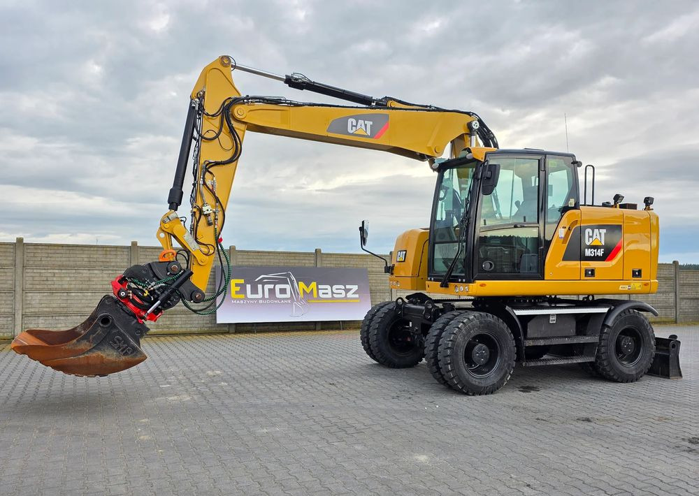 Caterpillar M314F, 2016 ROK, GŁOWICA ROTOTILT, 4400 MTH - Escavadeira de rodas: foto 1 Caterpillar M314F, 2016 ROK, GŁOWICA ROTOTILT, 4400 MTH - Escavadeira de rodas: foto 1