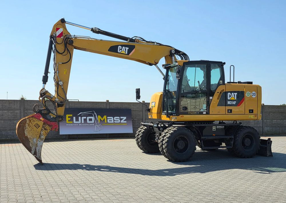 Caterpillar M314F, 2019 ROK, 3300 MTH, OIL QUICK OQ 65 - Escavadeira de rodas: foto 1 Caterpillar M314F, 2019 ROK, 3300 MTH, OIL QUICK OQ 65 - Escavadeira de rodas: foto 1