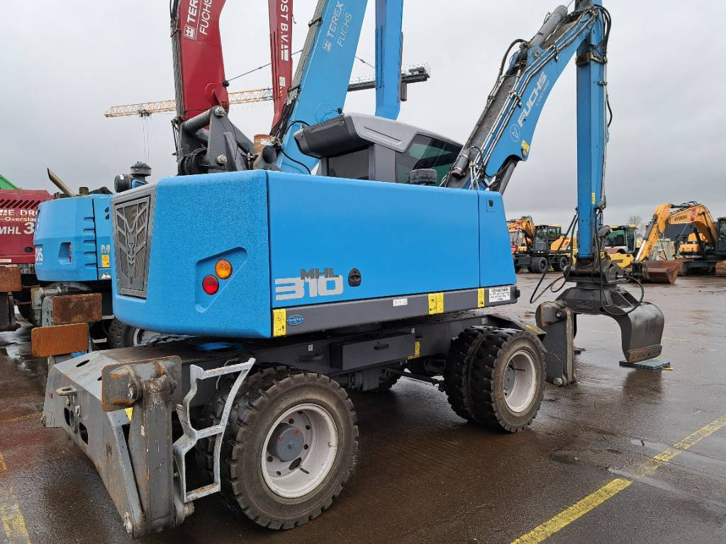 Fuchs MHL310F + Grapple - Manipulador de material: foto 1 Fuchs MHL310F + Grapple - Manipulador de material: foto 1