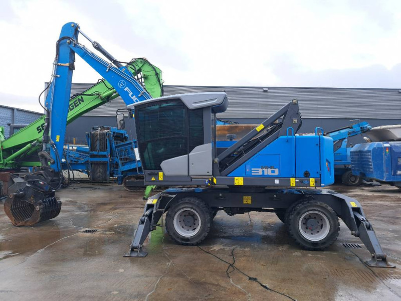 Fuchs MHL310F + Grapple - Manipulador de material: foto 4 Fuchs MHL310F + Grapple - Manipulador de material: foto 4