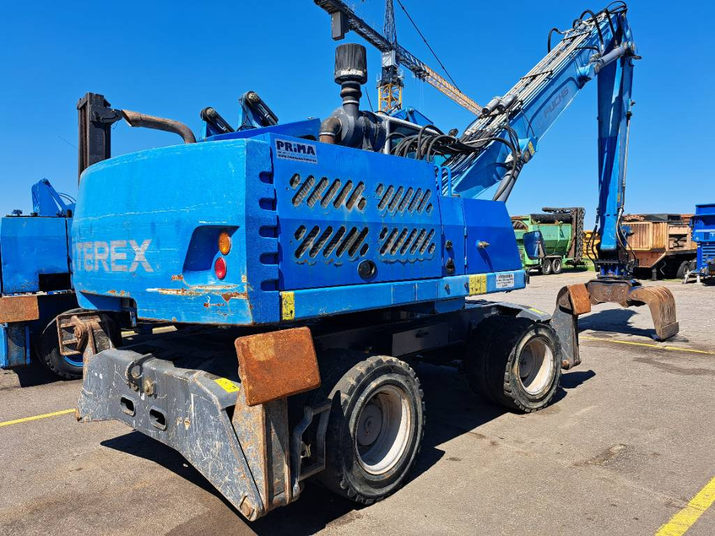 Fuchs MHL331E + Grapple - Manipulador de material: foto 1 Fuchs MHL331E + Grapple - Manipulador de material: foto 1