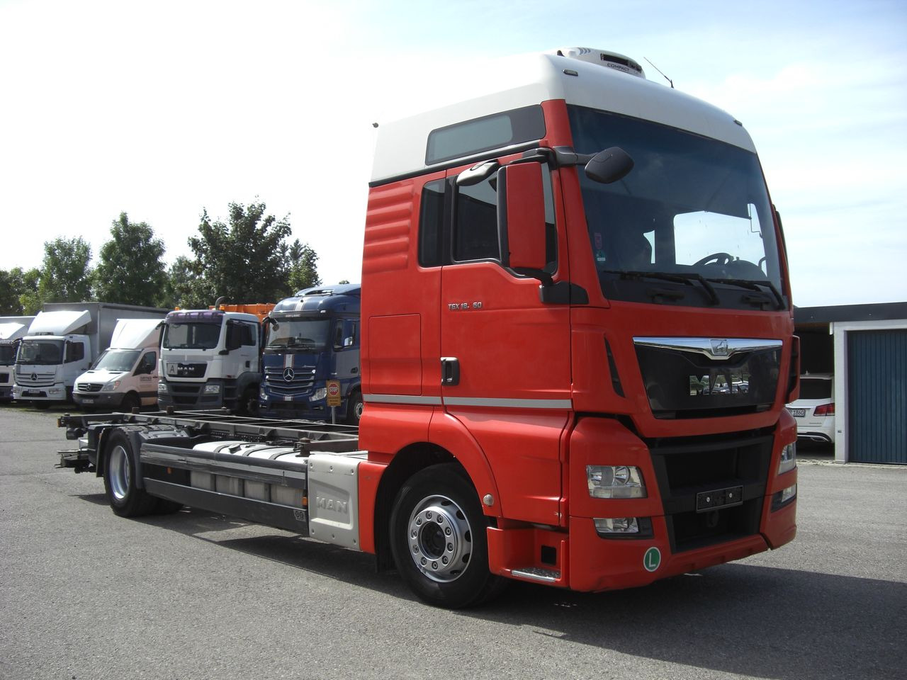 MAN 18360XXL TGX / LBW - Camião transportador de contêineres/ Caixa móvel: foto 2 MAN 18360XXL TGX / LBW - Camião transportador de contêineres/ Caixa móvel: foto 2