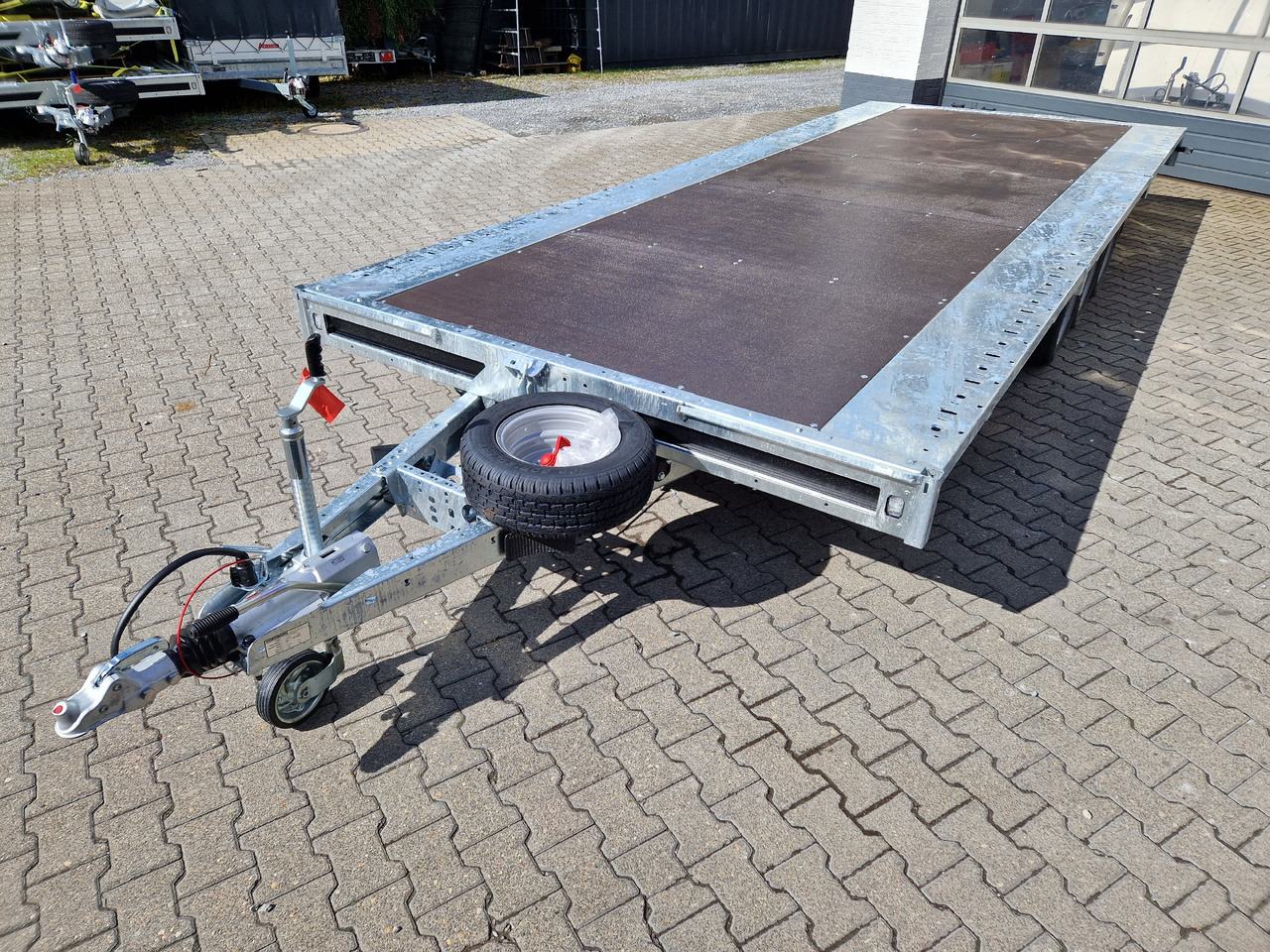 Brian James Trailer Connect 600x243cm plattform blackline Tridem 12" 3500kg - Reboque plataforma/ Caixa aberta: foto 1 Brian James Trailer Connect 600x243cm plattform blackline Tridem 12" 3500kg - Reboque plataforma/ Caixa aberta: foto 1