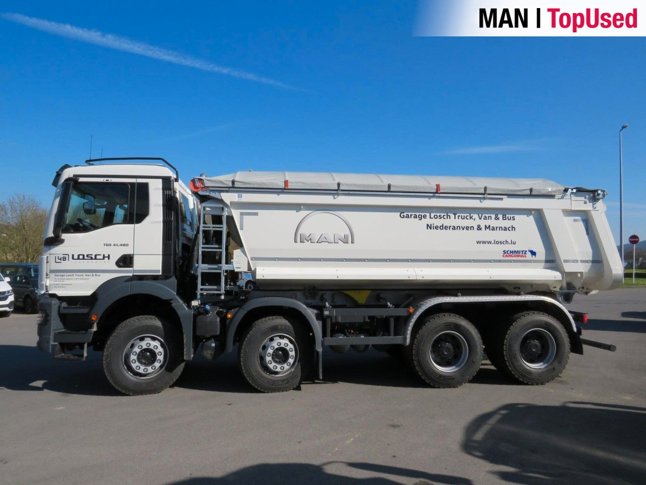 MAN TGS 41.480 8x4 BB CH Schmitz Muldenkipper - Camião multibenne: foto 2 MAN TGS 41.480 8x4 BB CH Schmitz Muldenkipper - Camião multibenne: foto 2