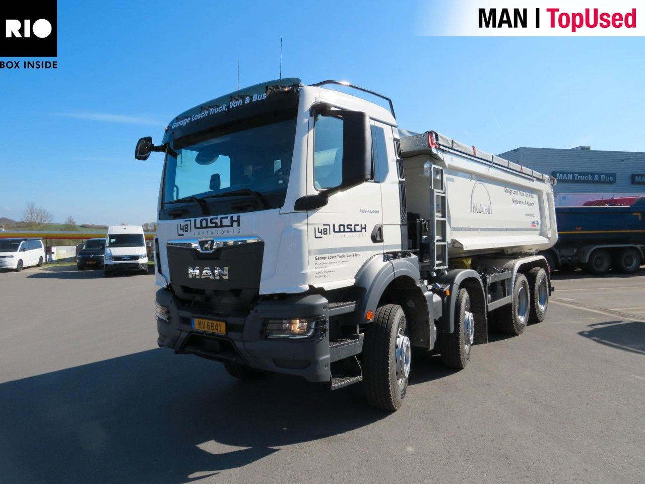 MAN TGS 41.480 8x4 BB CH Schmitz Muldenkipper - Camião multibenne: foto 1 MAN TGS 41.480 8x4 BB CH Schmitz Muldenkipper - Camião multibenne: foto 1
