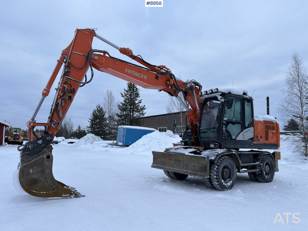 Hitachi ZX 170 W Wheeled excavator with tipper wagon and attachments - Escavadeira de rodas: foto 1 Hitachi ZX 170 W Wheeled excavator with tipper wagon and attachments - Escavadeira de rodas: foto 1