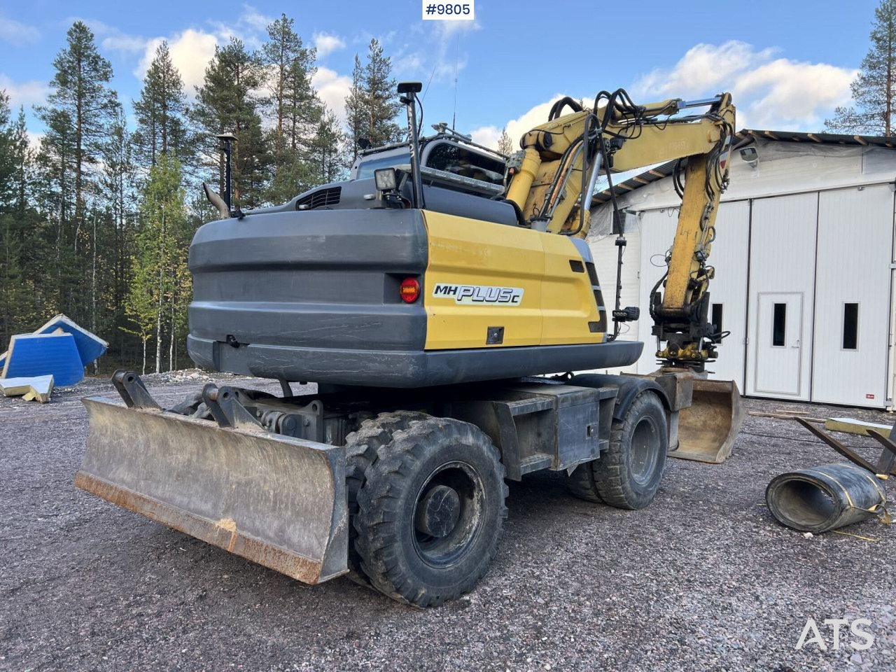 New Holland, MH-Plus-C Wheel excavator with excavation system, rotor, and grader bucket - Escavadeira de rodas: foto 4 New Holland, MH-Plus-C Wheel excavator with excavation system, rotor, and grader bucket - Escavadeira de rodas: foto 4