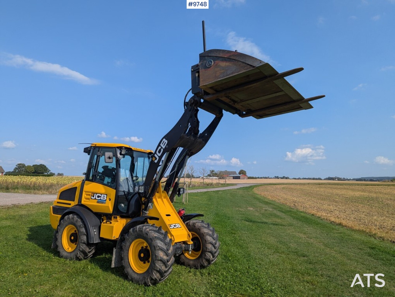 Wheel loader JCB 409 Stage V Nordic Edition 40km/h with attachments - Pá carregadora de rodas: foto 2 Wheel loader JCB 409 Stage V Nordic Edition 40km/h with attachments - Pá carregadora de rodas: foto 2