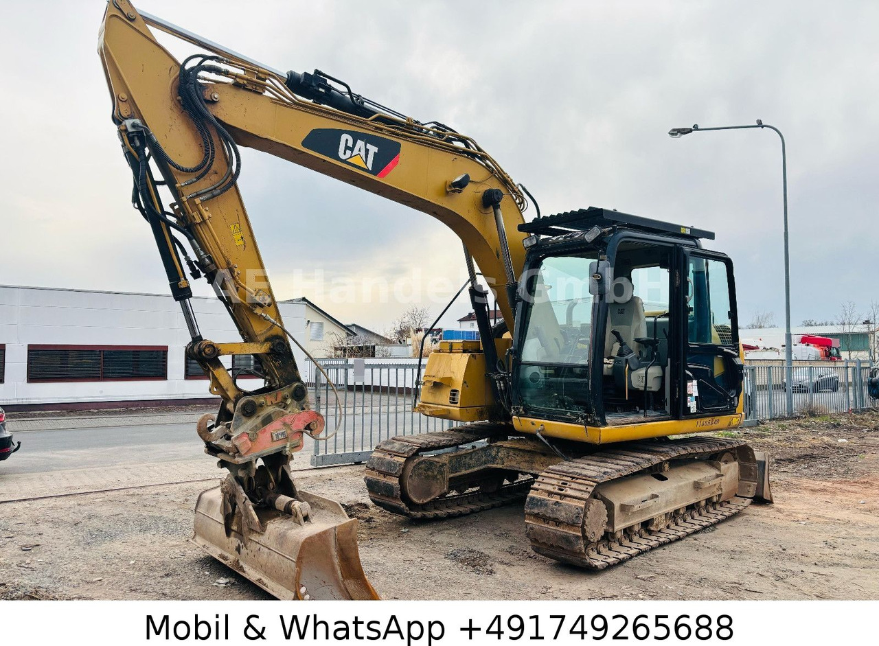 CAT 311D *6600Std./Schnellwechsler/Schaufel/Klima - Escavadora de rastos: foto 1 CAT 311D *6600Std./Schnellwechsler/Schaufel/Klima - Escavadora de rastos: foto 1