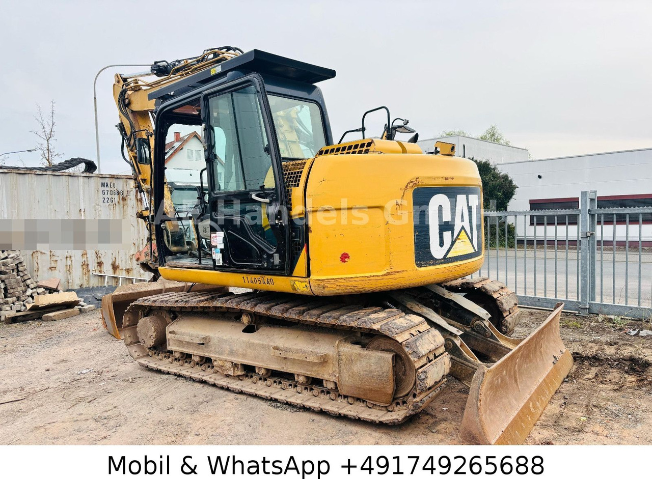 CAT 311D *6600Std./Schnellwechsler/Schaufel/Klima - Escavadora de rastos: foto 5 CAT 311D *6600Std./Schnellwechsler/Schaufel/Klima - Escavadora de rastos: foto 5