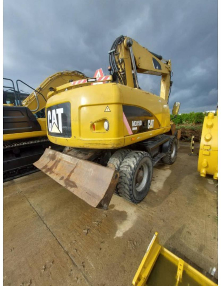 CAT M315D - Escavadeira de rodas: foto 3 CAT M315D - Escavadeira de rodas: foto 3