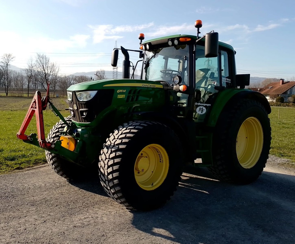 John Deere 6115M, EU Papiere - Trator: foto 1 John Deere 6115M, EU Papiere - Trator: foto 1