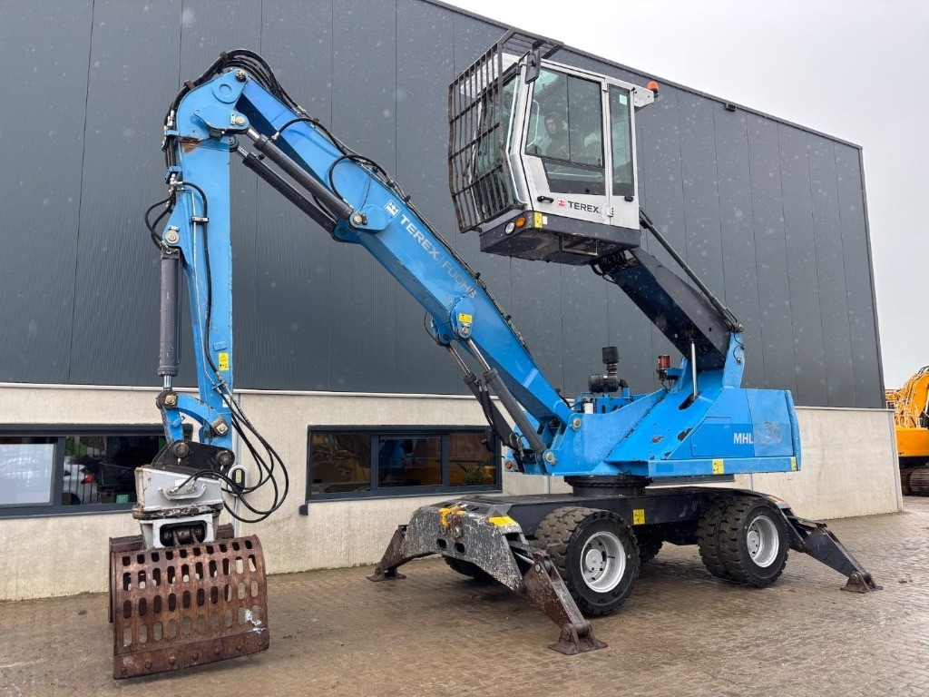 Fuchs MHL 320 D - Manipulador de material: foto 1 Fuchs MHL 320 D - Manipulador de material: foto 1