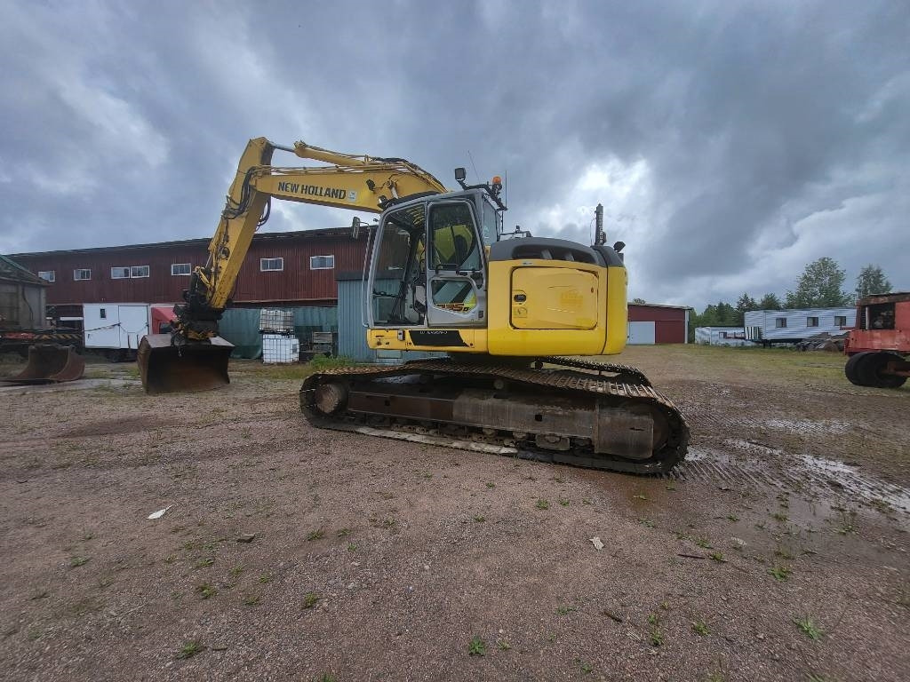 New Holland Kobelco E 235 B SR-2 - Escavadora de rastos: foto 5 New Holland Kobelco E 235 B SR-2 - Escavadora de rastos: foto 5