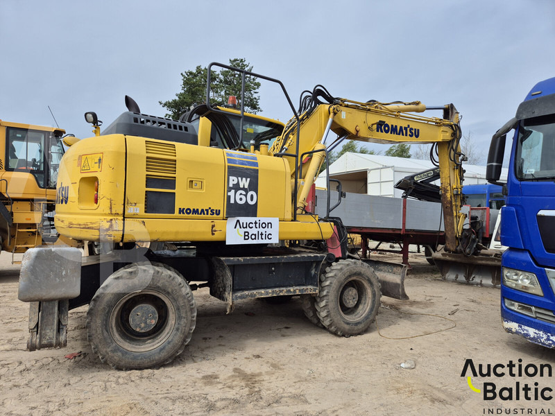 Komatsu PW160 - Escavadeira de rodas: foto 1 Komatsu PW160 - Escavadeira de rodas: foto 1