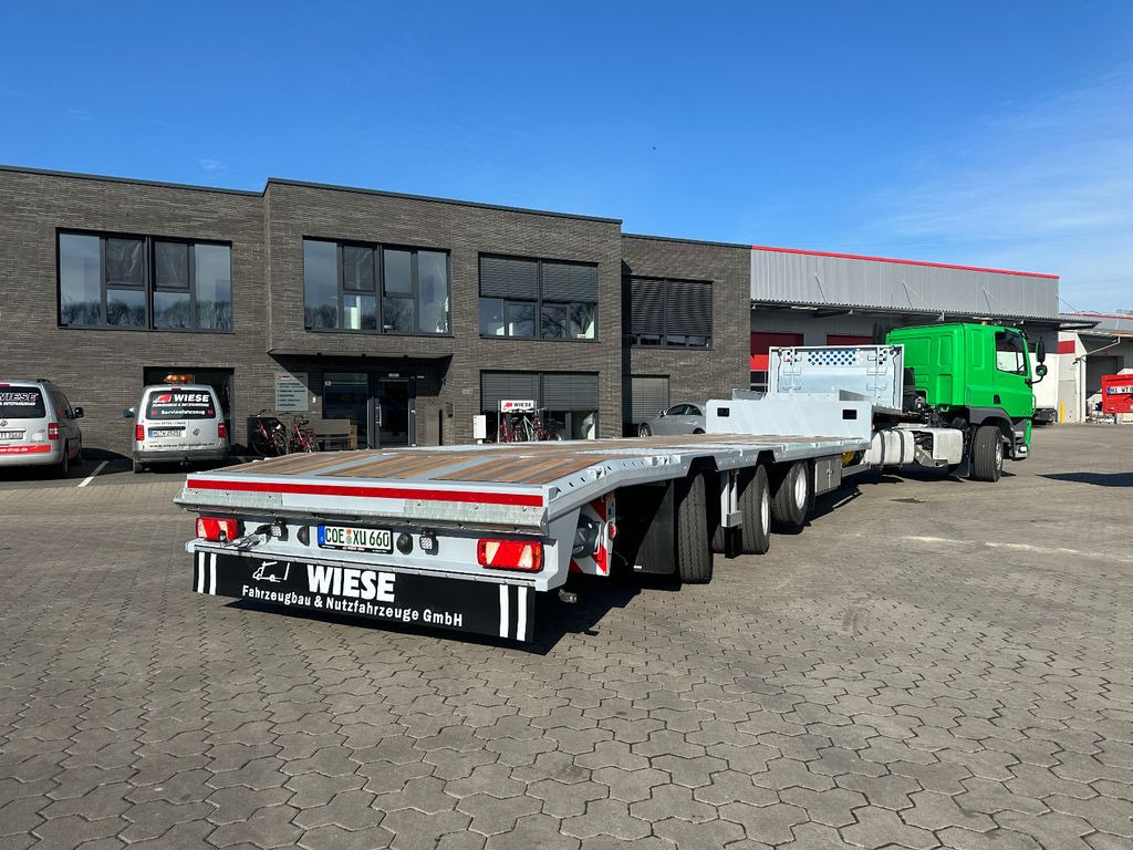 3-Achser Tieflader Zwangslenkung Betonteile - Semi-reboque baixa: foto 1 3-Achser Tieflader Zwangslenkung Betonteile - Semi-reboque baixa: foto 1